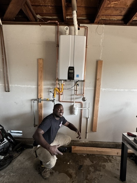 A Marvelous plumber installs a tankless water heater.